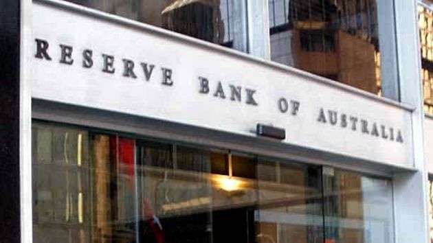 A man walks into the Reserve Bank of Australia building in Sydney.