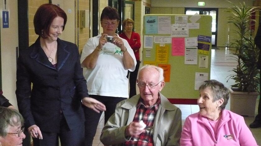 Julia Gillard speaks with older voters while on the campaign trail in Perth