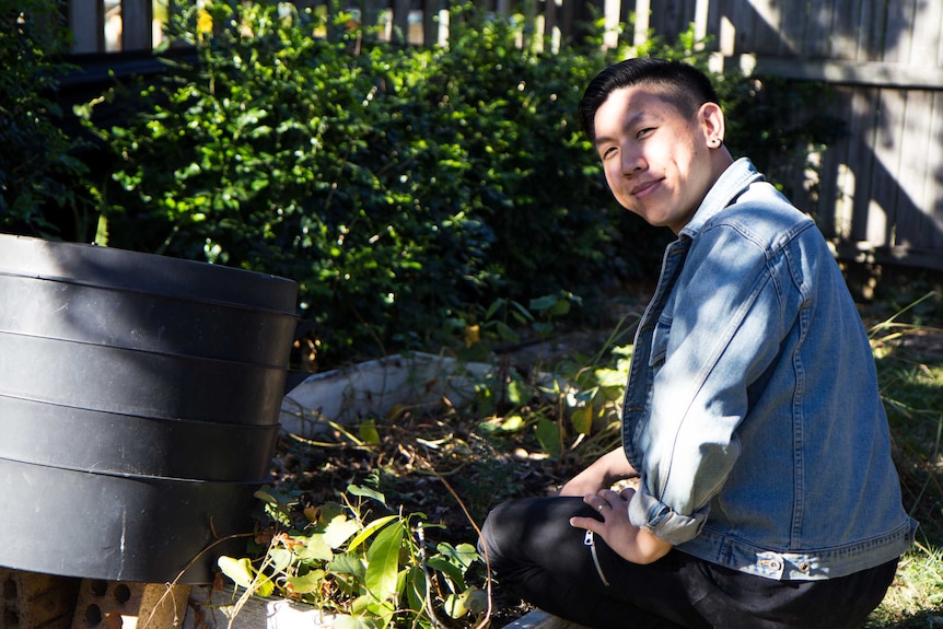 Mikey Tai in his garden.