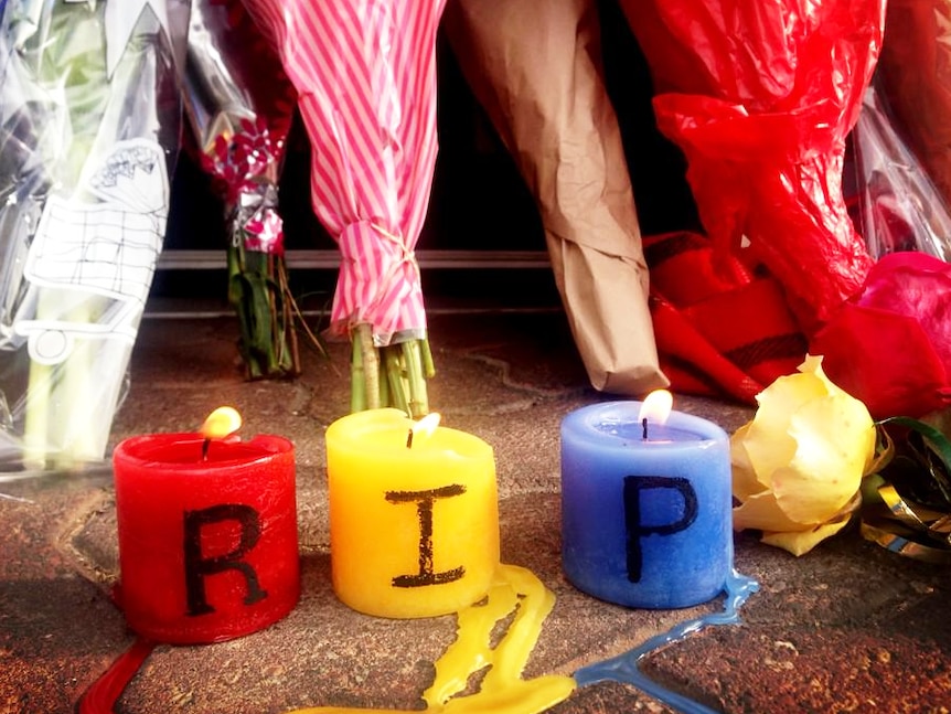 RIP candles in memory of Phil Walsh