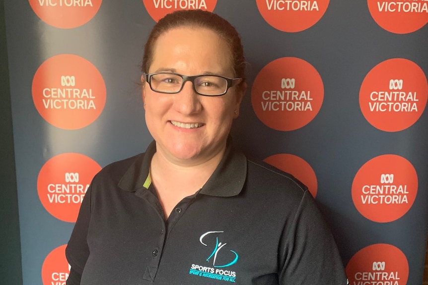 Lauren Fawcett standing in front of an ABC Central Victoria banner.