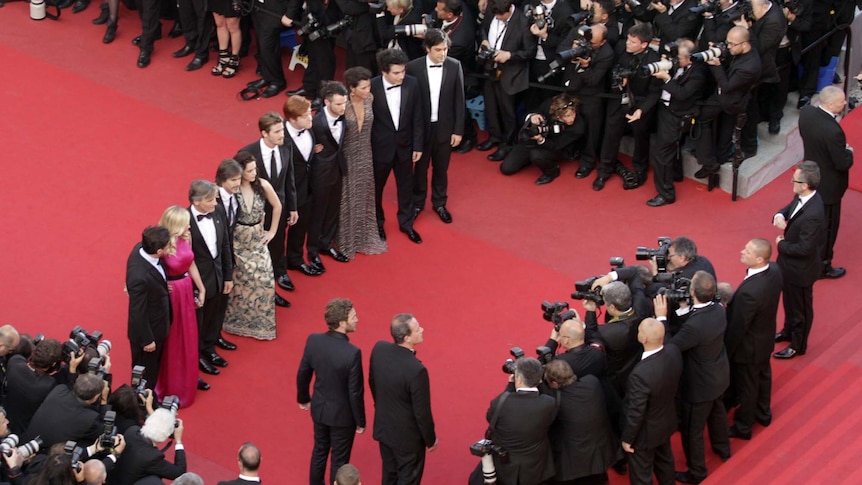 The cast of On The Road pose for a photo