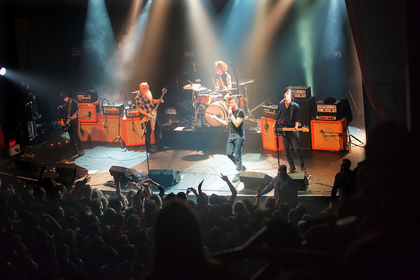 American rock group Eagles of Death Metal perform on stage at the Bataclan.