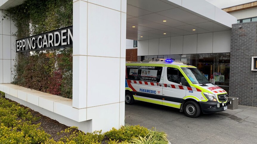 An ambulance outside the Epping Gardens Aged Care facility.