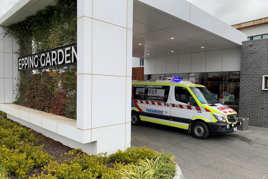 An ambulance outside the Epping Gardens Aged Care facility.