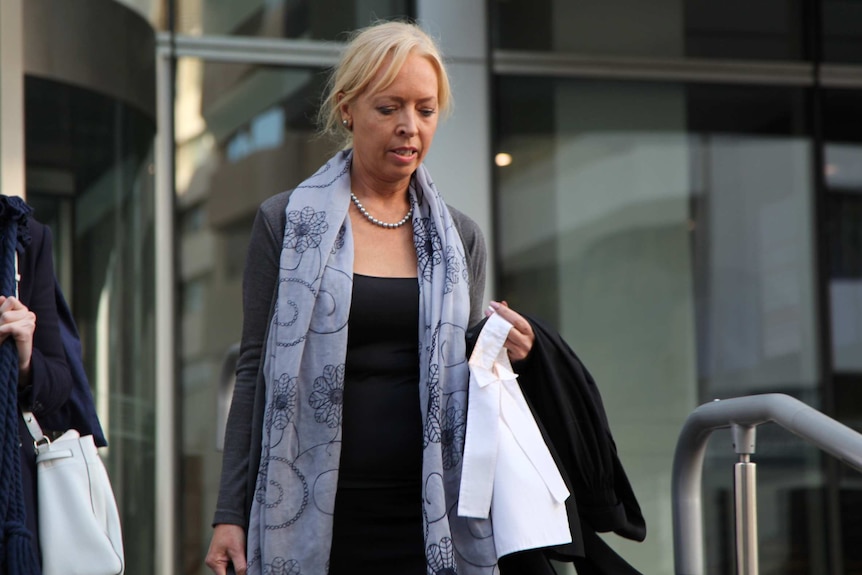 Shaun Southern's defence lawyer Justine Fisher walks down steps outside a Perth court.