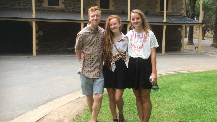 Harry Nevill from Britain and Felicia Jidborn and Isabella Johansson from Sweden
