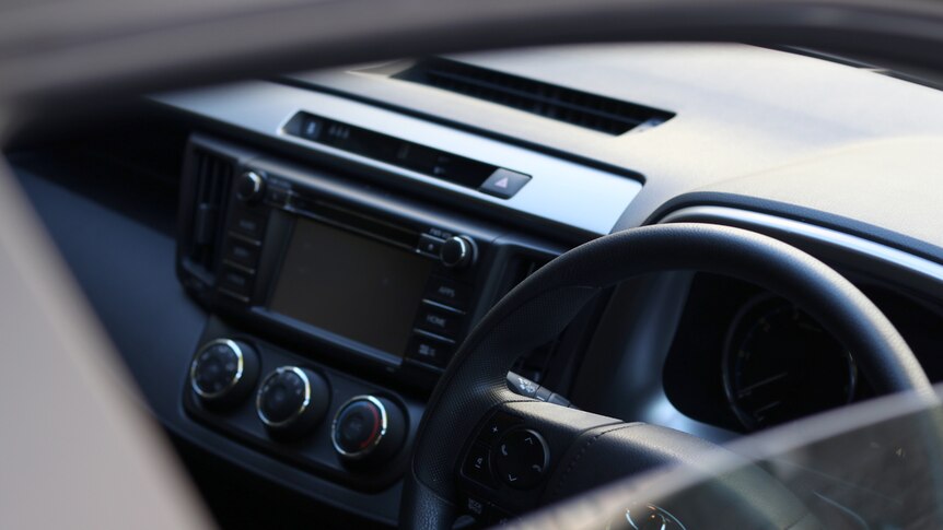 A car with an open window.