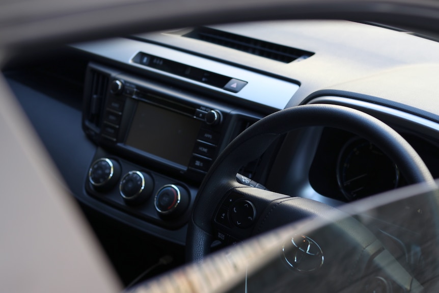 A car with an open window.