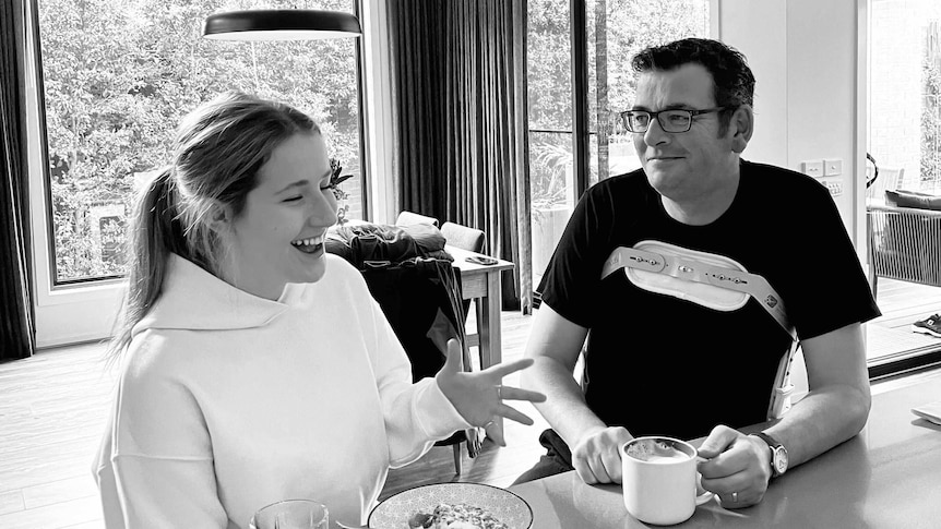 Daniel Andrews, pictured at home with his daughter