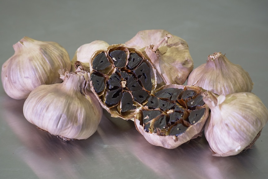 Photo of black garlic bulbs