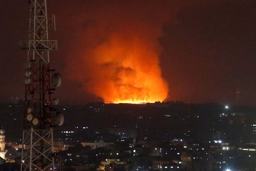 Smoke rises after an Israeli forces strike in Gaza