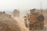 Peshmerga military vehicles drive north of Mosul