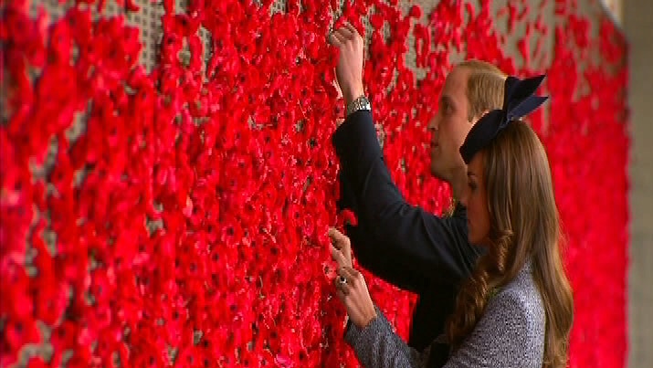 The Royal couple add poppies to the Roll of Honour at the Australian War Memorial in Canberra.