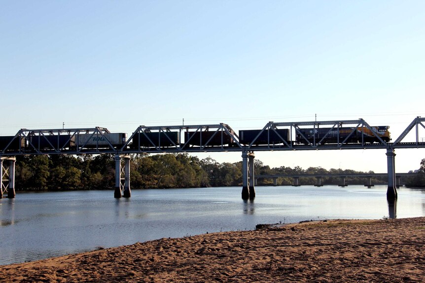 A train passes over the rail bridge in Bundaberg.