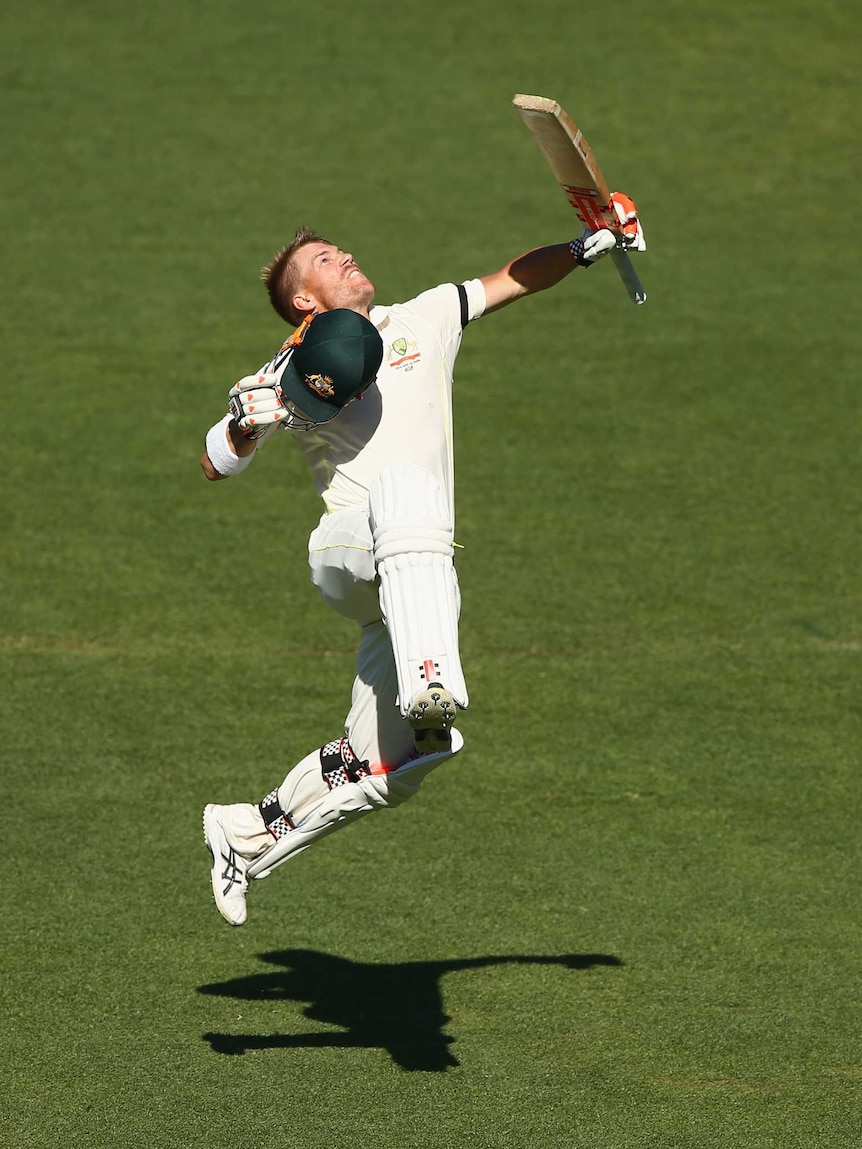 David Warner celebrates his second century of the first Test in Adelaide