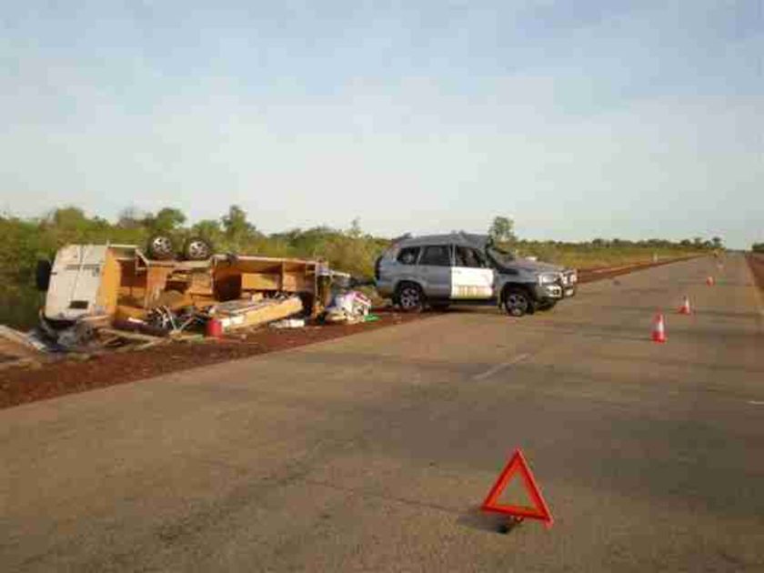 Car towing caravan flips on highway - ABC News