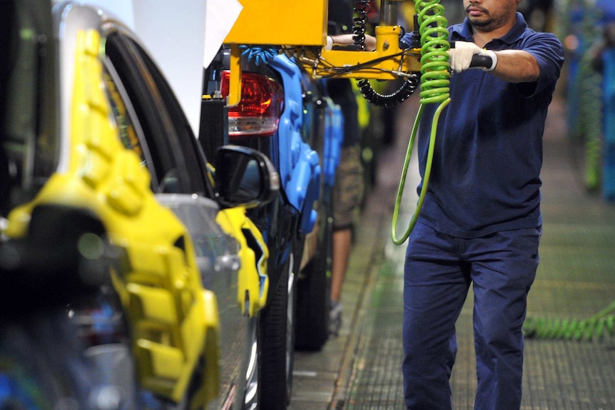 A Ford employee works on the assembly line in Broadmeadows.