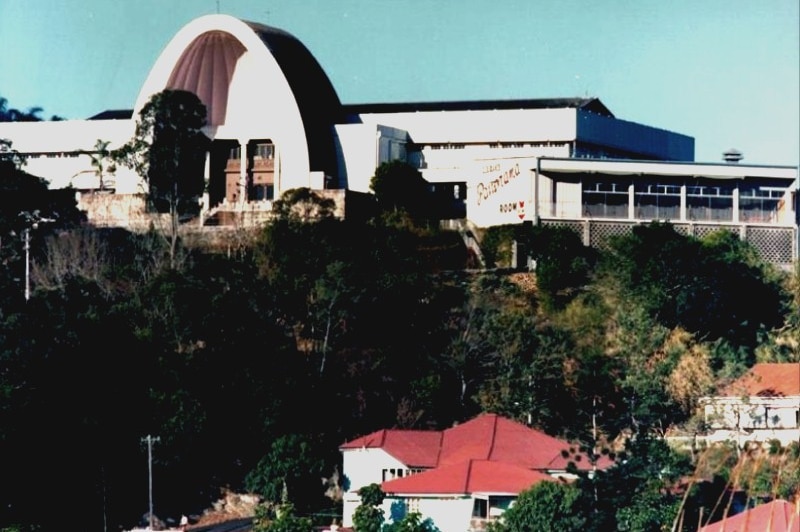 The former Cloudland Ballroom with its iconic arch on a hill overlooking Brisbane