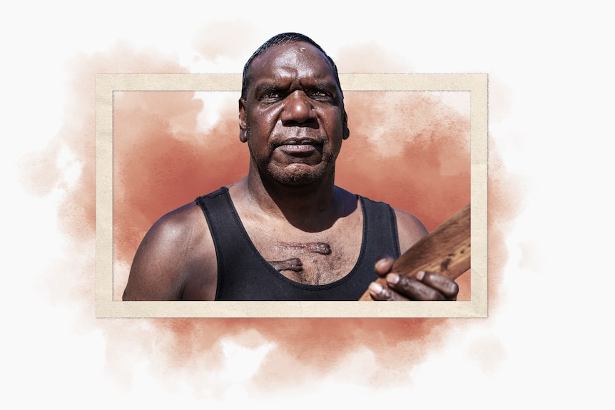 an aboriginal man wearing a black singlet
