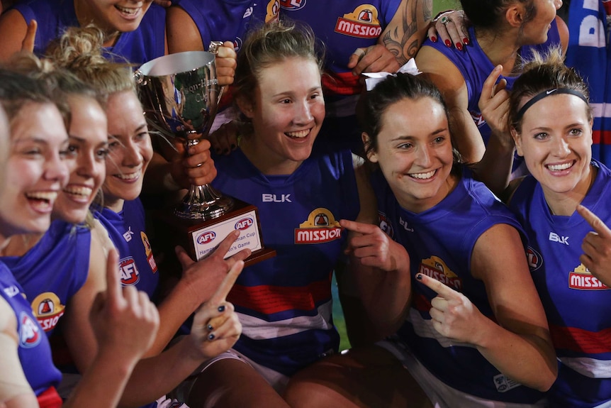 Western Bulldogs players celebrate after their win over Melbourne in the AFL Women's All-Stars game.