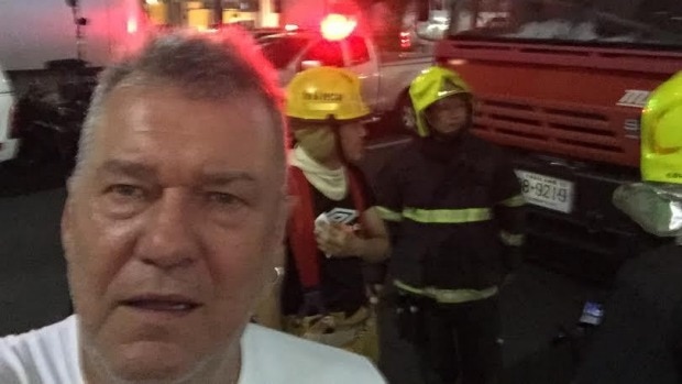 Jimmy Barnes takes a selfie at the scene of a bomb blast in Bangkok