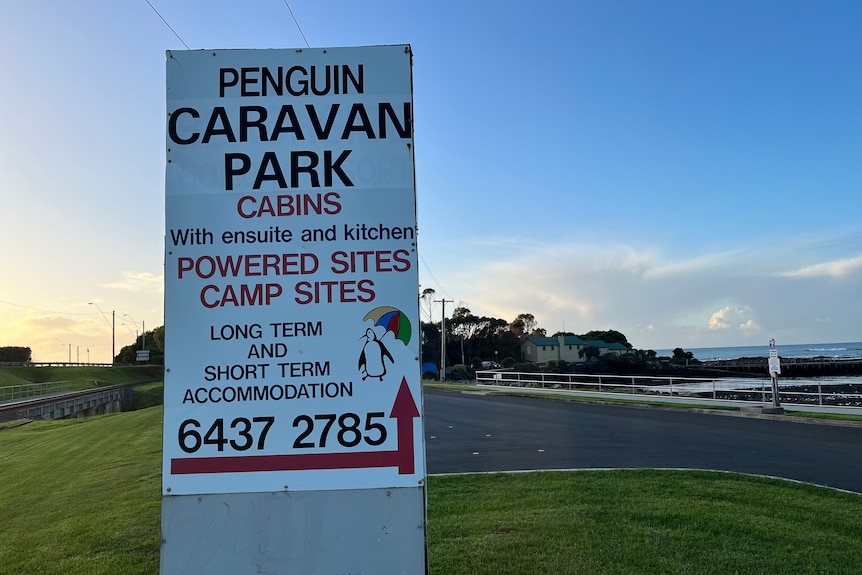 Signage outside the Penguin Caravan park, offering powered and camp sites, long and short term accommodation 