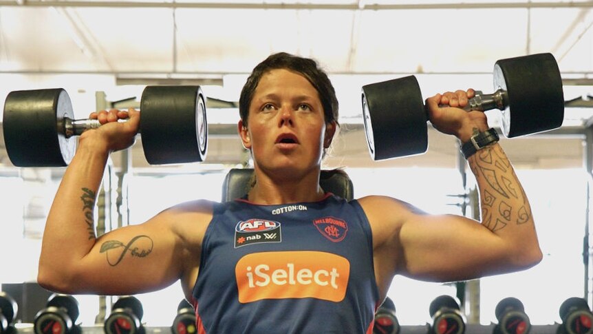 AFLW player Richelle Cranston working out in the gym.