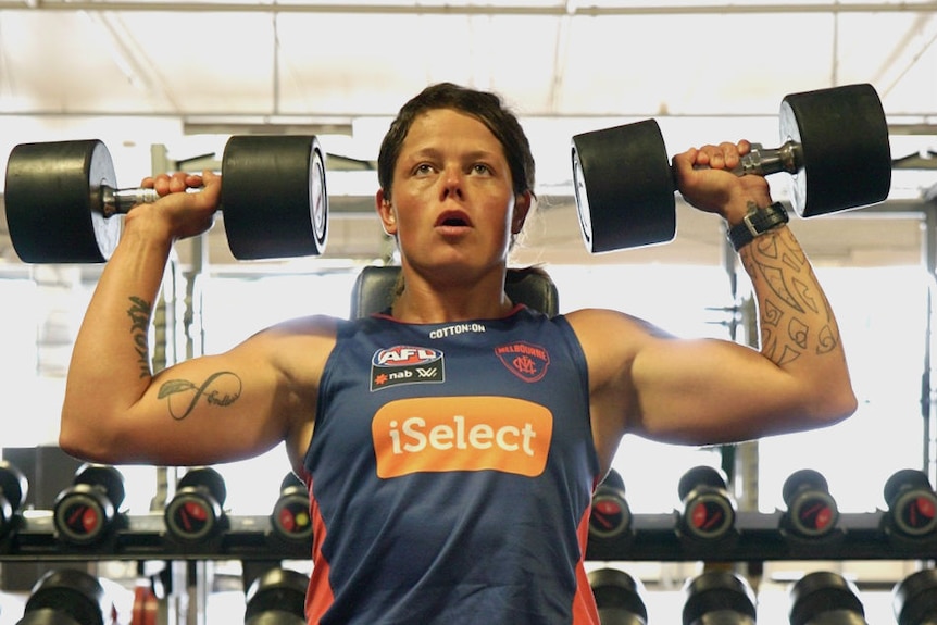 AFLW player Richelle Cranston working out in the gym.