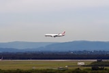 Brisbane airport. Plane coming into landing. Virgin
