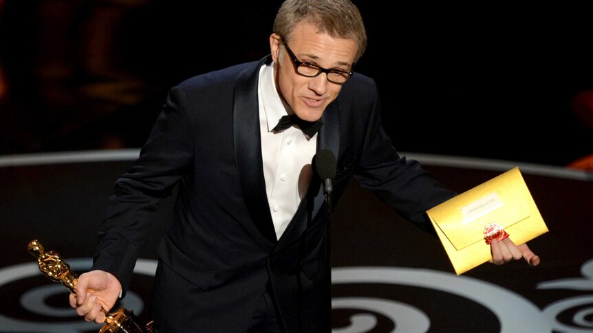 Christoph Waltz accepts his Best Supporting Actor Oscar.
