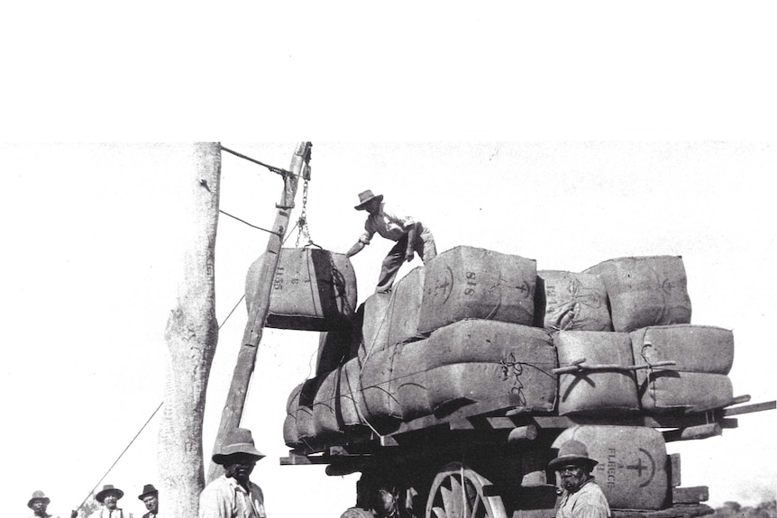 Loading the wool with a hand hoist