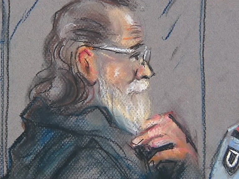 A court sketch of a serial rapist Robert John Fardon, man in his 70s with a grey beard.
