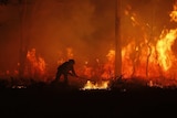 A firefighter battling a fire