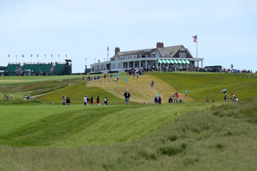 General view of the clubhouse as seen from off the 1st fairway of the 118th U.S. Open golf tournament at Shinnecock Hills