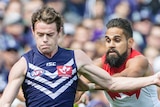 Swans' Jetta tackles Freo's Neale