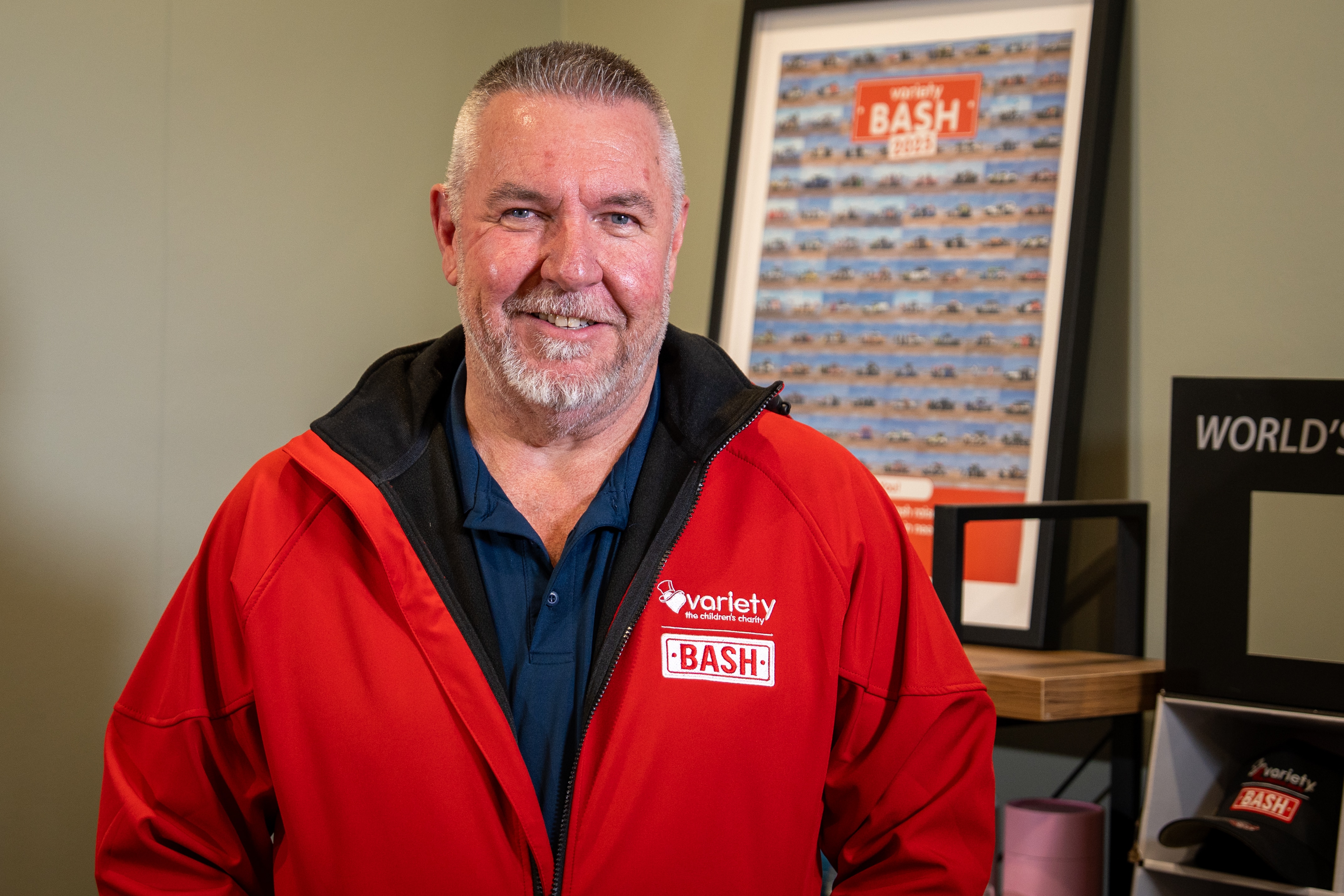 A man wearing a red jacket