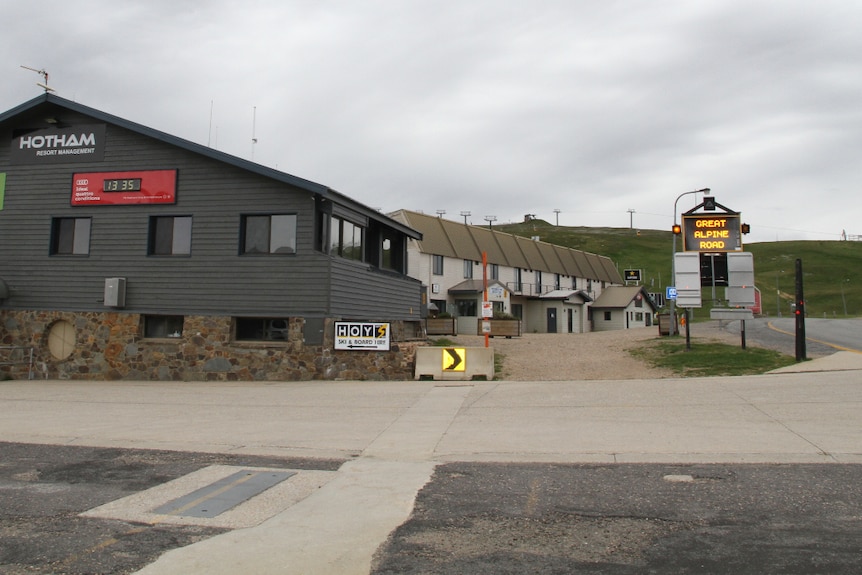 Several buildings that appear shut up, with no people around.