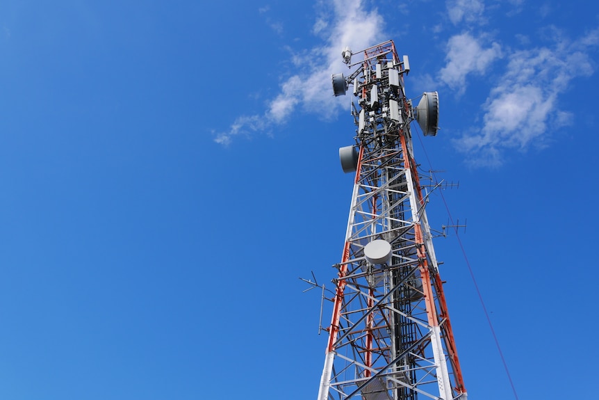 Orange and white telecommunications tower in Townsville. 