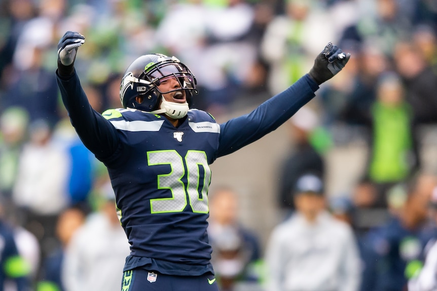 Seattle Seahawks strong safety Bradley McDougald interacts with fans
