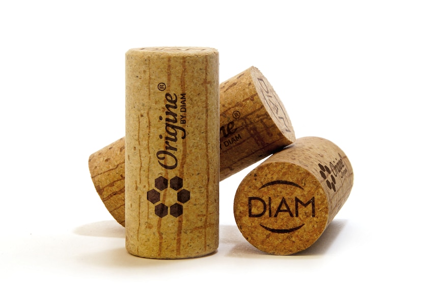 Three corks on a white background.