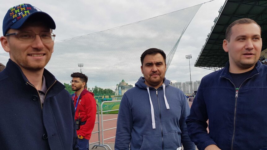Three Russian men at a Socceroos training session in Kazan, Russia on June 11, 2018.