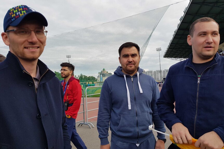 Three Russian men at a Socceroos training session in Kazan, Russia on June 11, 2018.