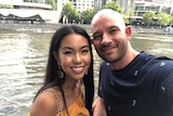 Lisa Du and Brad Donnini take a selfie in front of water