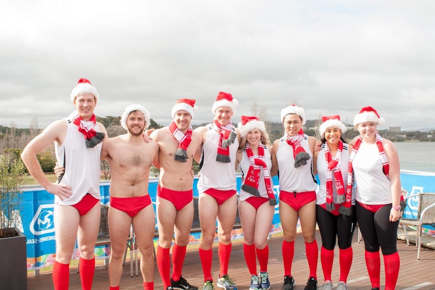 Nick Dewey, third from left, with other participants in the2015 Santa Speedo Shuffle