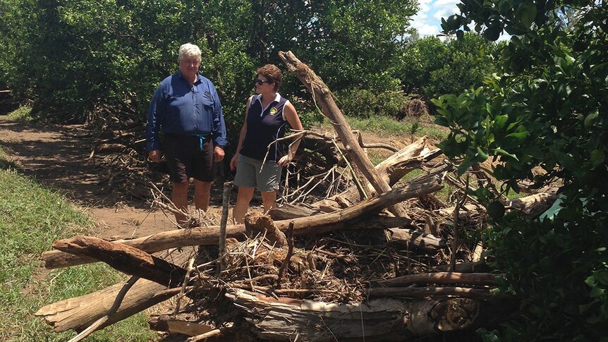 Citrus growers Ken and Megan Roth on their property at Gayndah