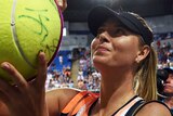 Maria Sharapova signs autographs after Australian Open first round win