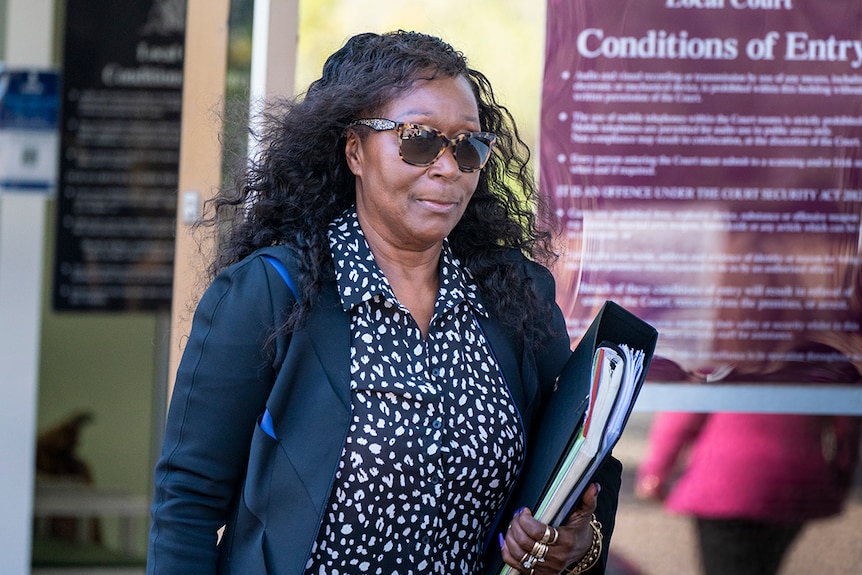 Thelma Gray walks out of Darwin Local Court.