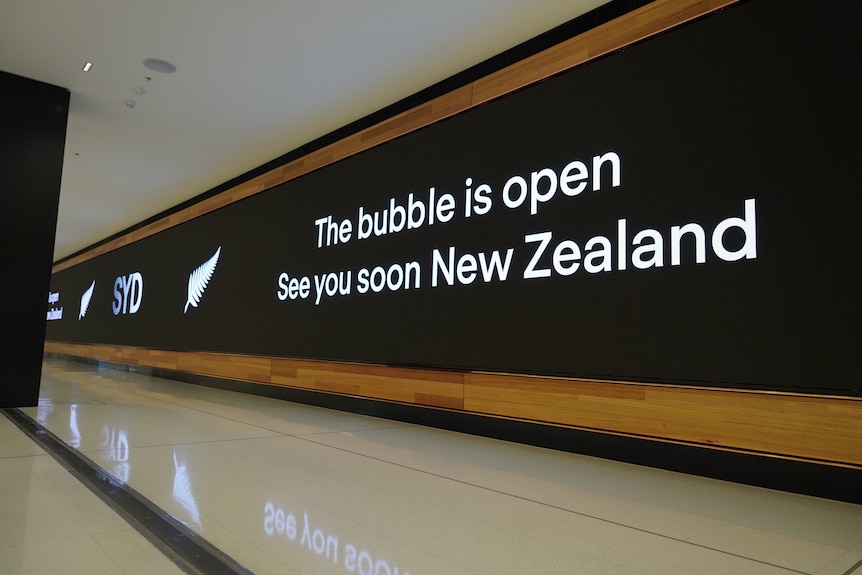 A sign which reads "The bubble is open. See you soon New Zealand".