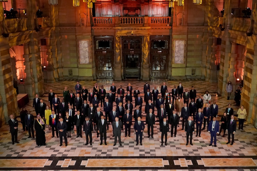 Dozen of world leaders pose together in group photo in Glasgow 